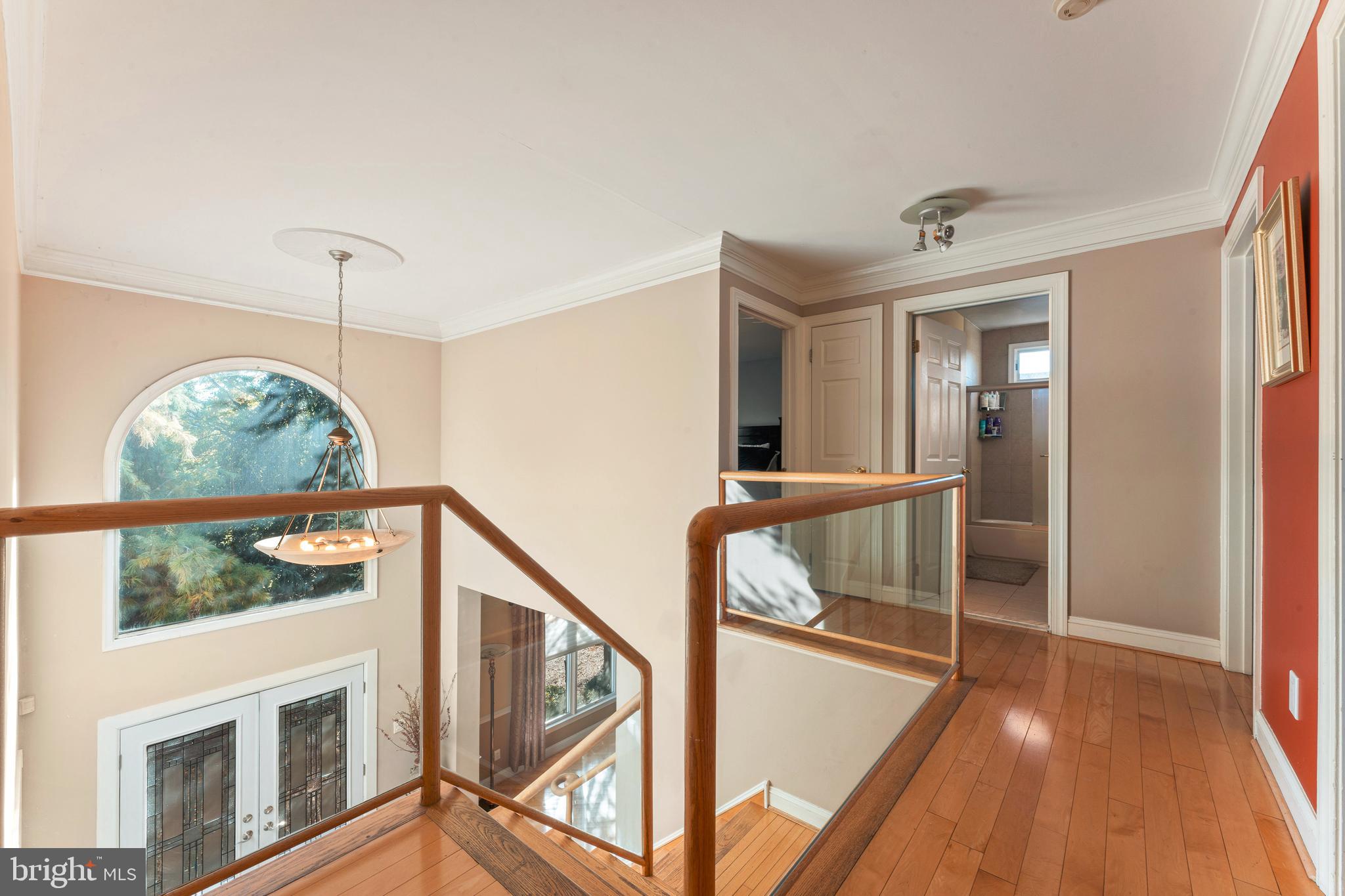 67 Lenape Road Richboro, PA 18954 - Photo 19 of 43 a view of entryway and hall with wooden floor