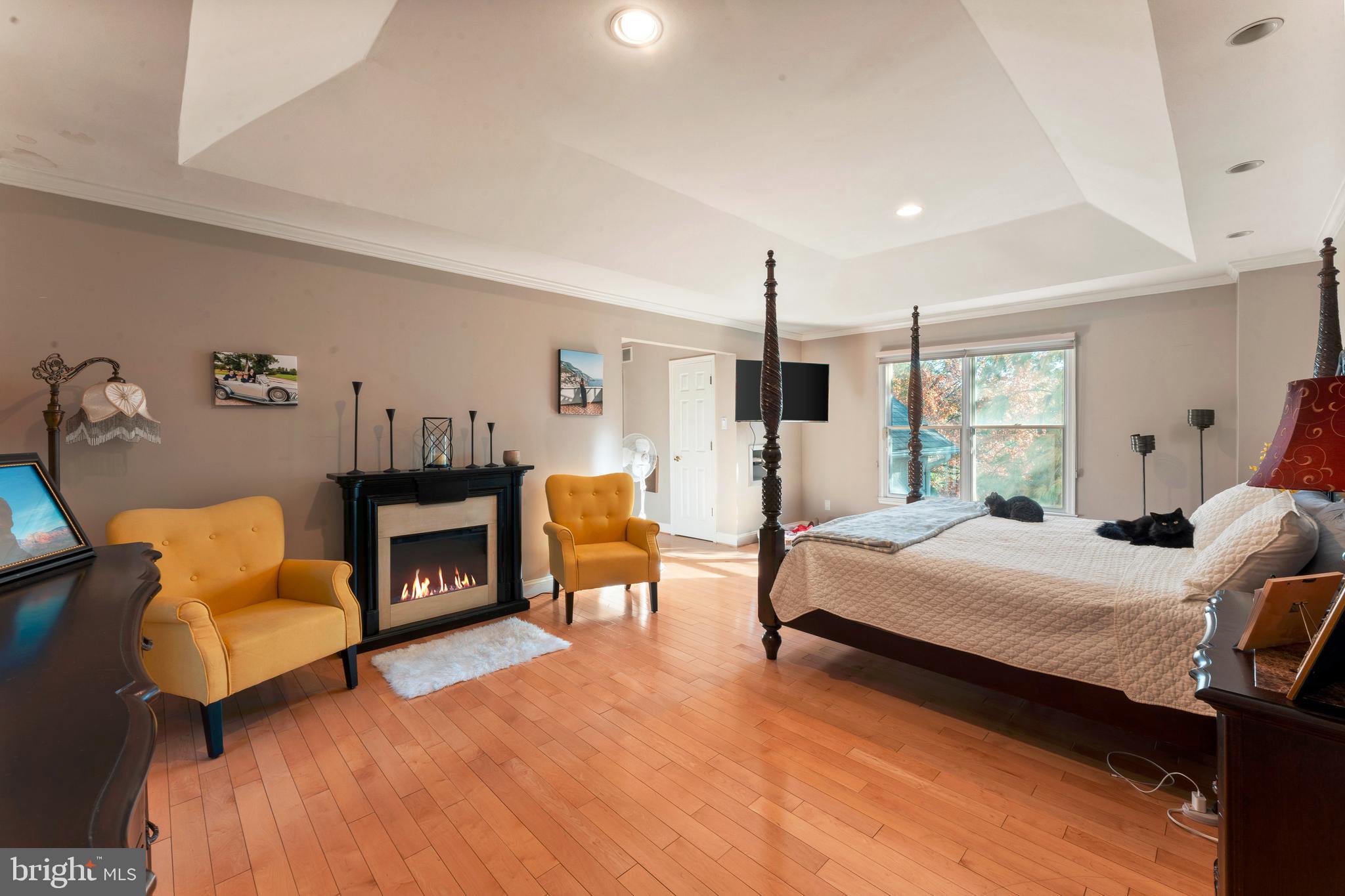 67 Lenape Road Richboro, PA 18954 - Photo 20 of 43 a bedroom with furniture and a fireplace