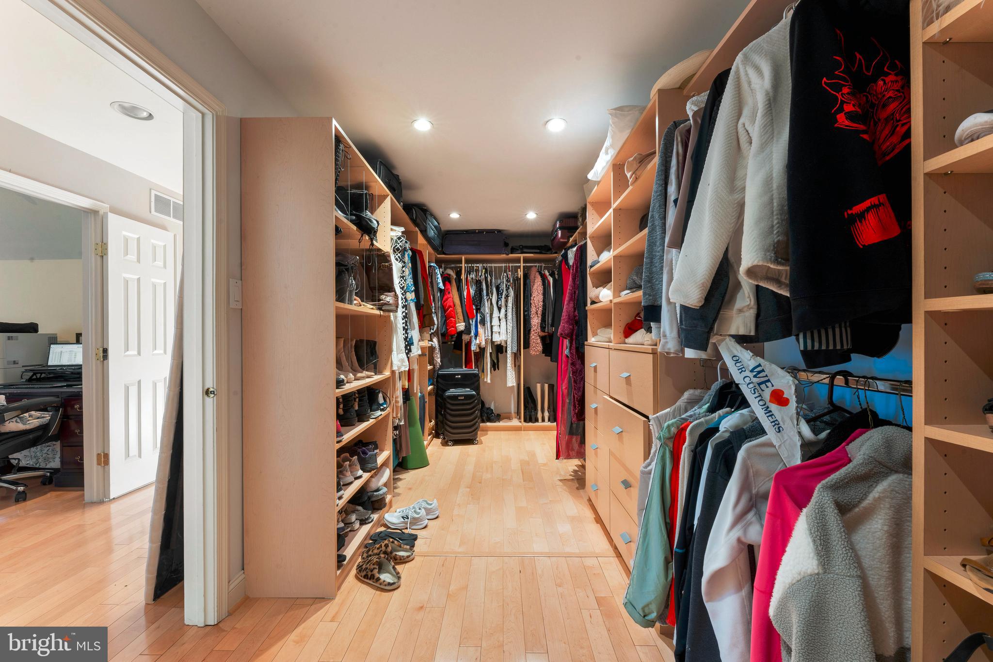 67 Lenape Road Richboro, PA 18954 - Photo 27 of 43 a view of walk in closet with clothes and shoes