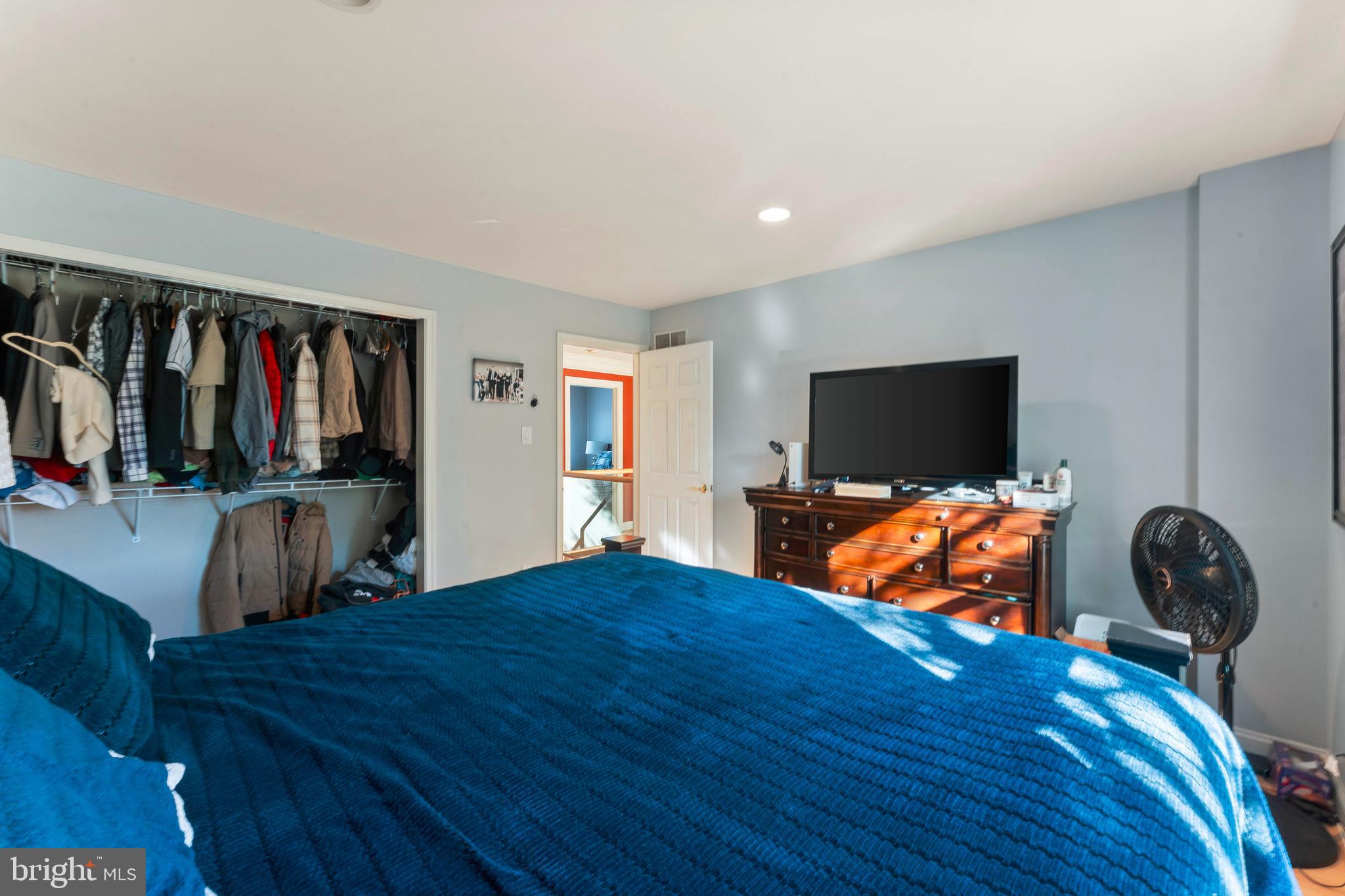 67 Lenape Road Richboro, PA 18954 - Photo 29 of 43 a bedroom with furniture and a flat screen tv