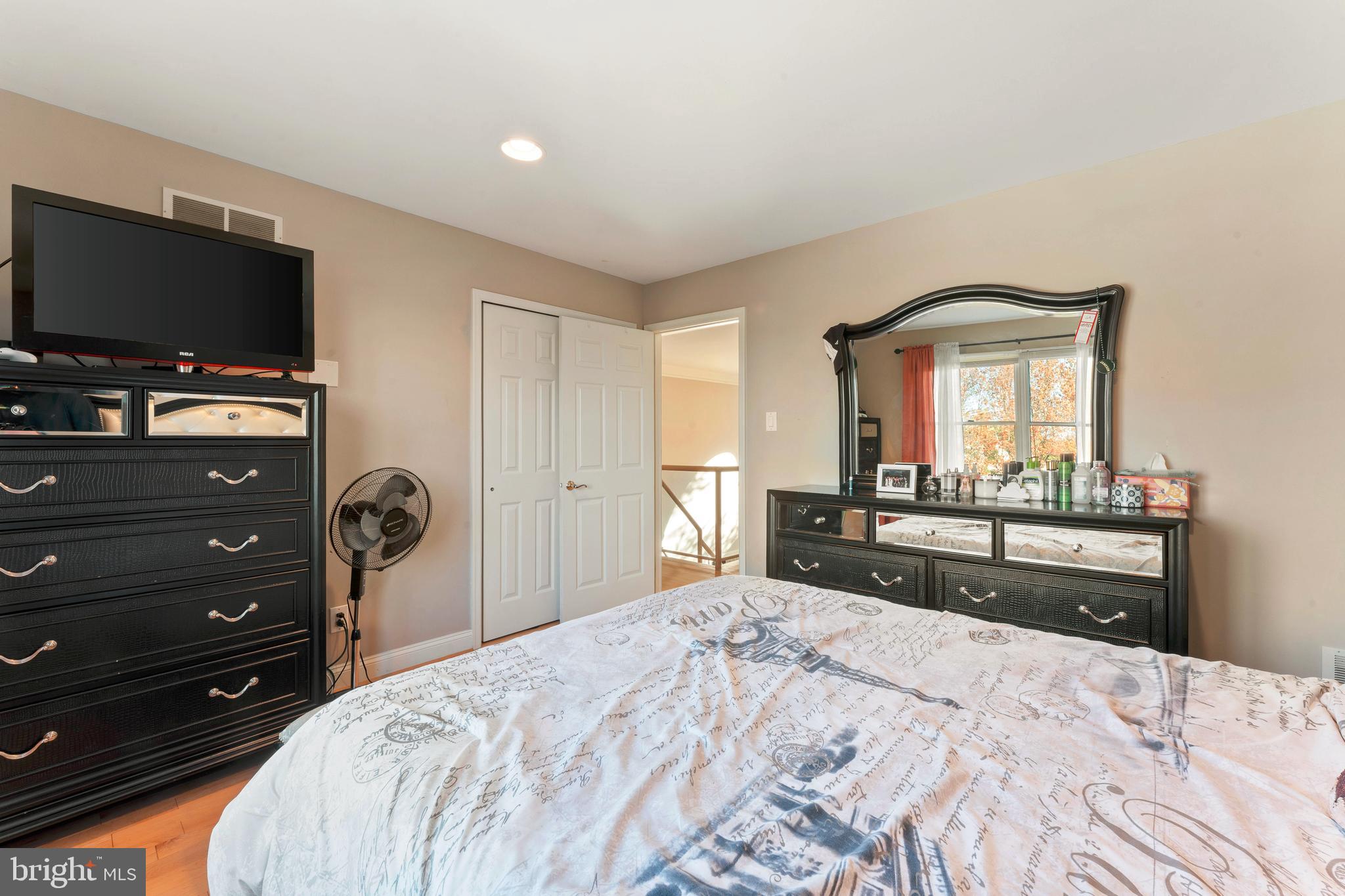 67 Lenape Road Richboro, PA 18954 - Photo 31 of 43 a bedroom with a bed and a flat screen tv