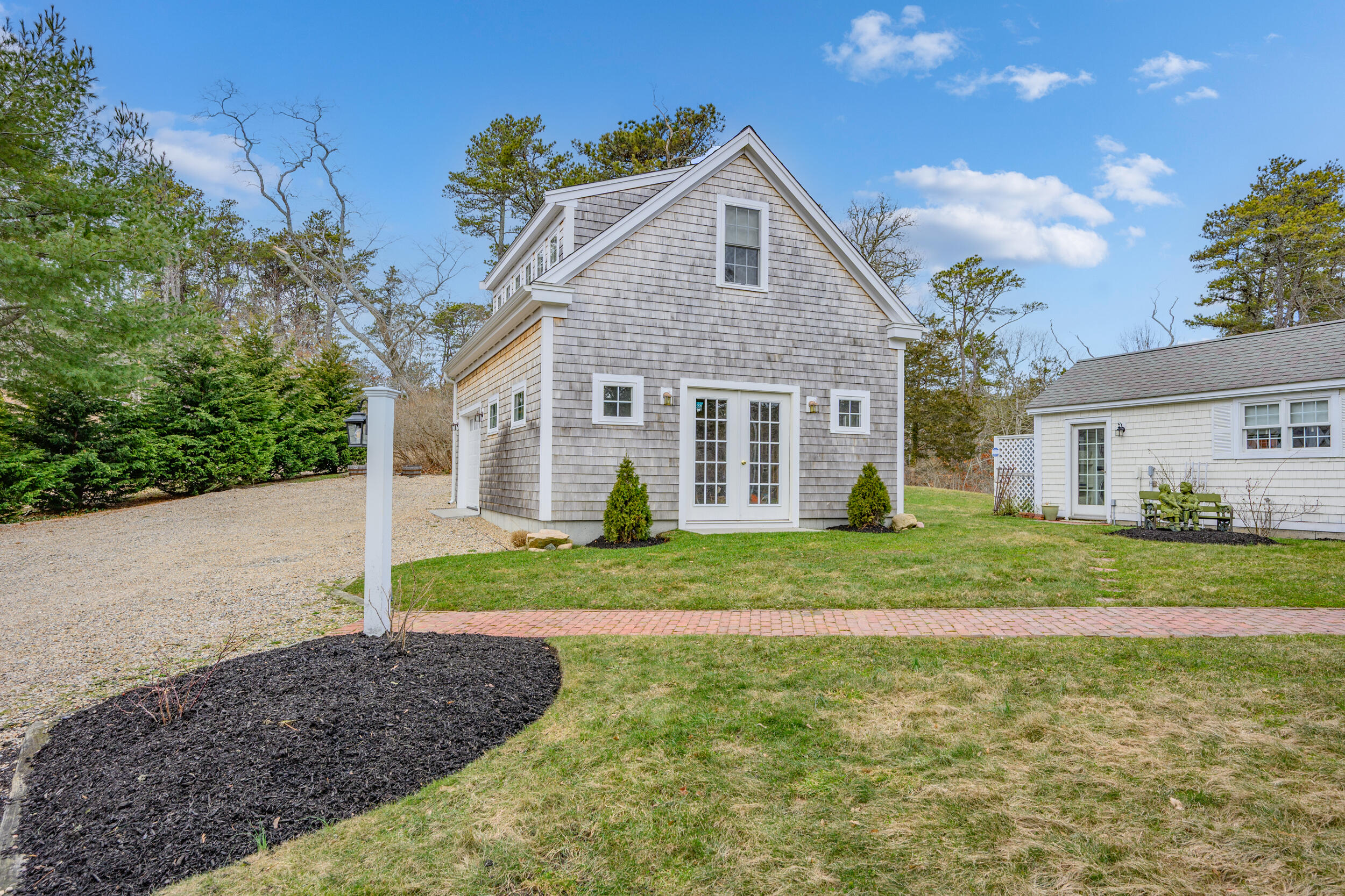 332 South Orleans Road Orleans, MA 02653 - Photo 29 of 42 a front view of a house with a yard