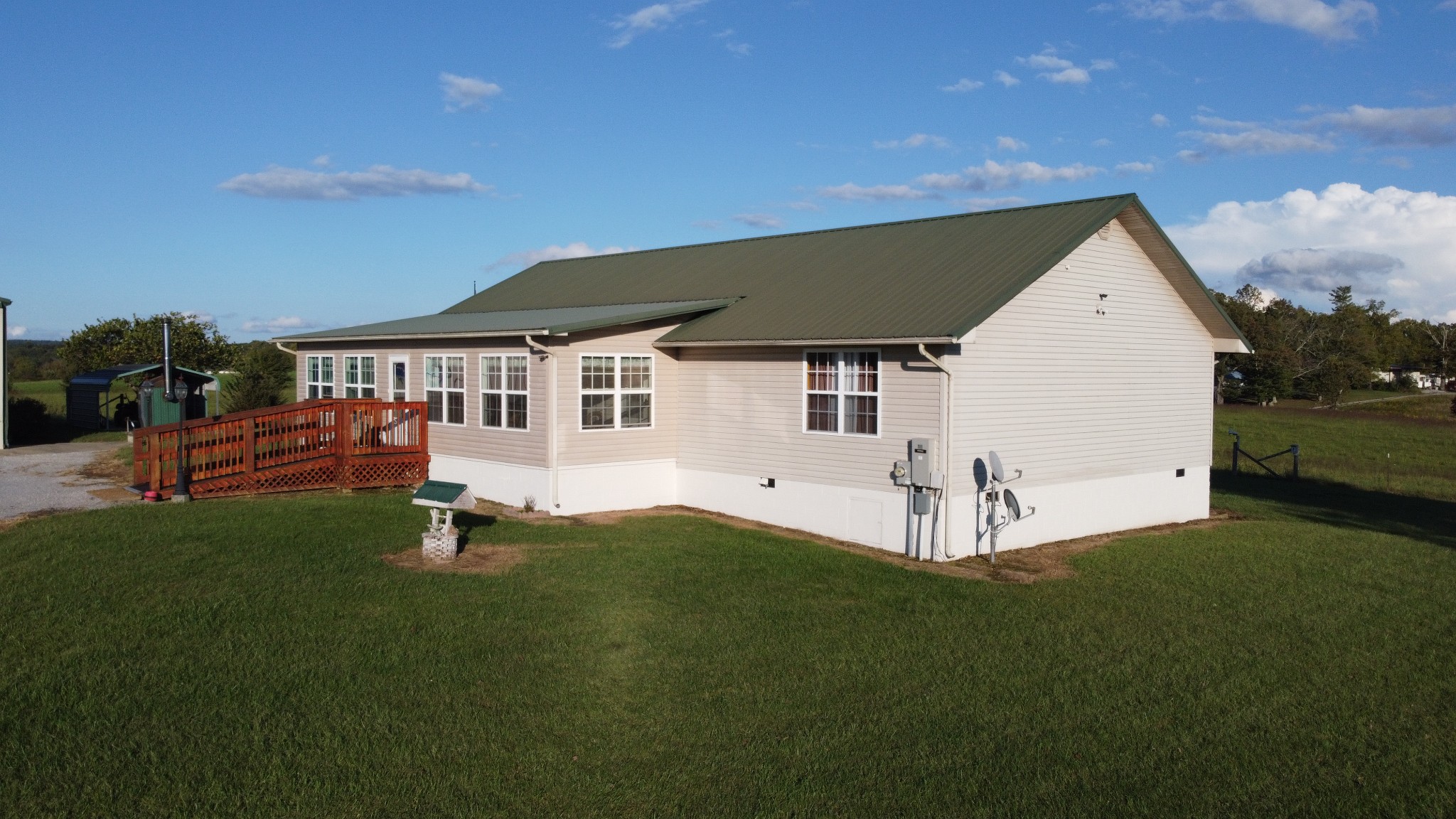 12343 Griffith Road Pikeville, TN 37367 - Photo 2 of 28 a view of a house with backyard and garden
