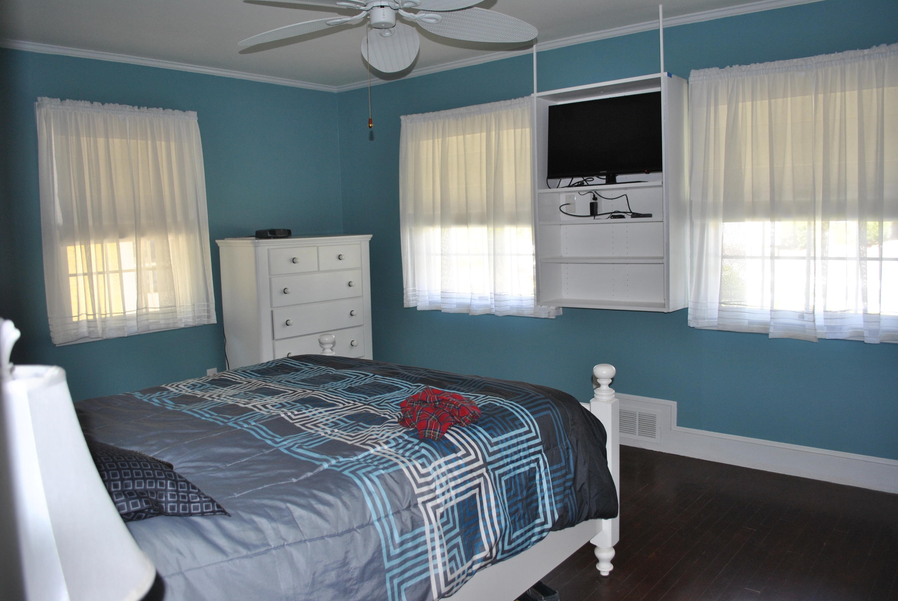 83 Lake Drive Centerville, MA 02632 - Photo 11 of 35 a bedroom with a bed and a flat screen tv