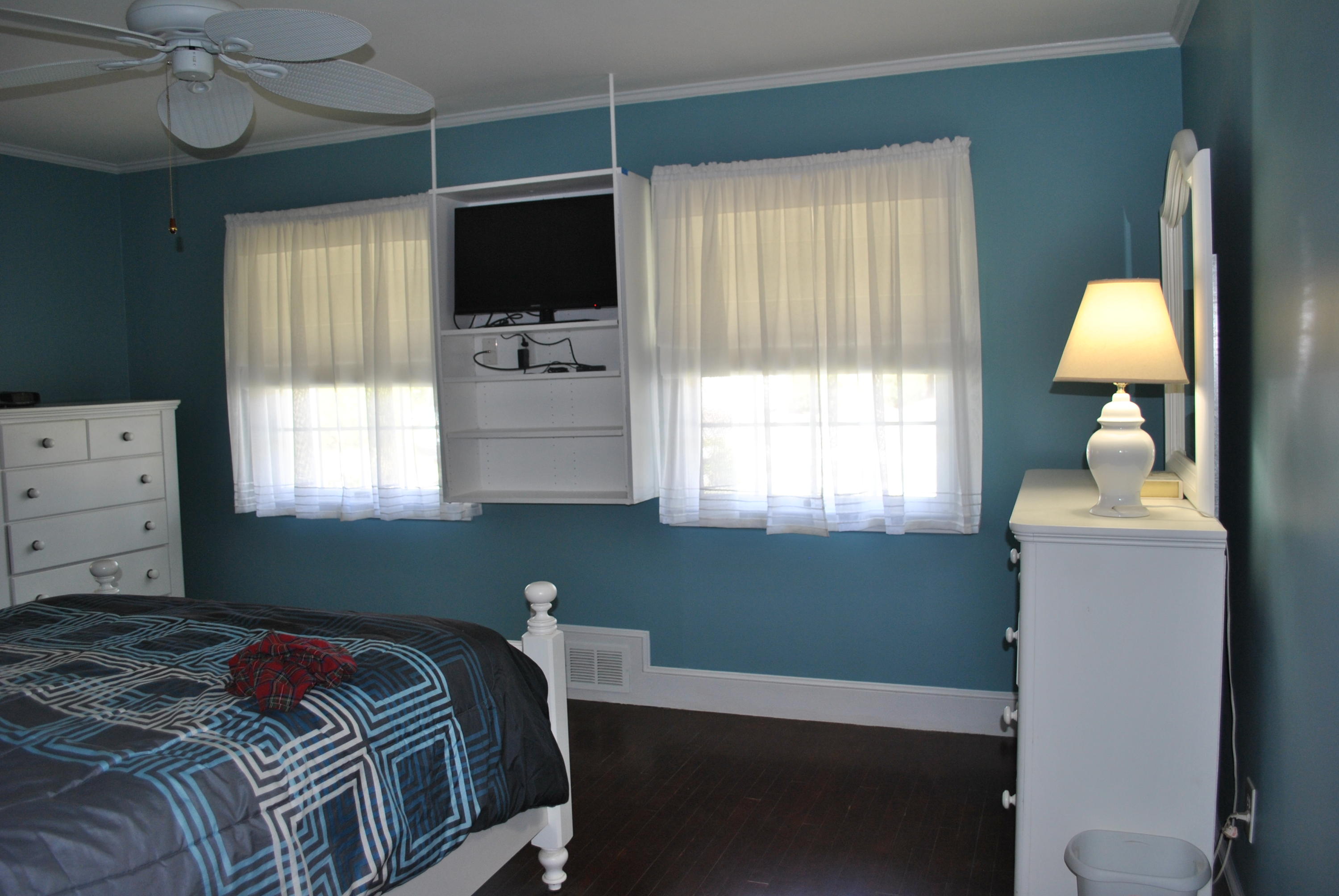 83 Lake Drive Centerville, MA 02632 - Photo 12 of 35 a bedroom with a bed and a window