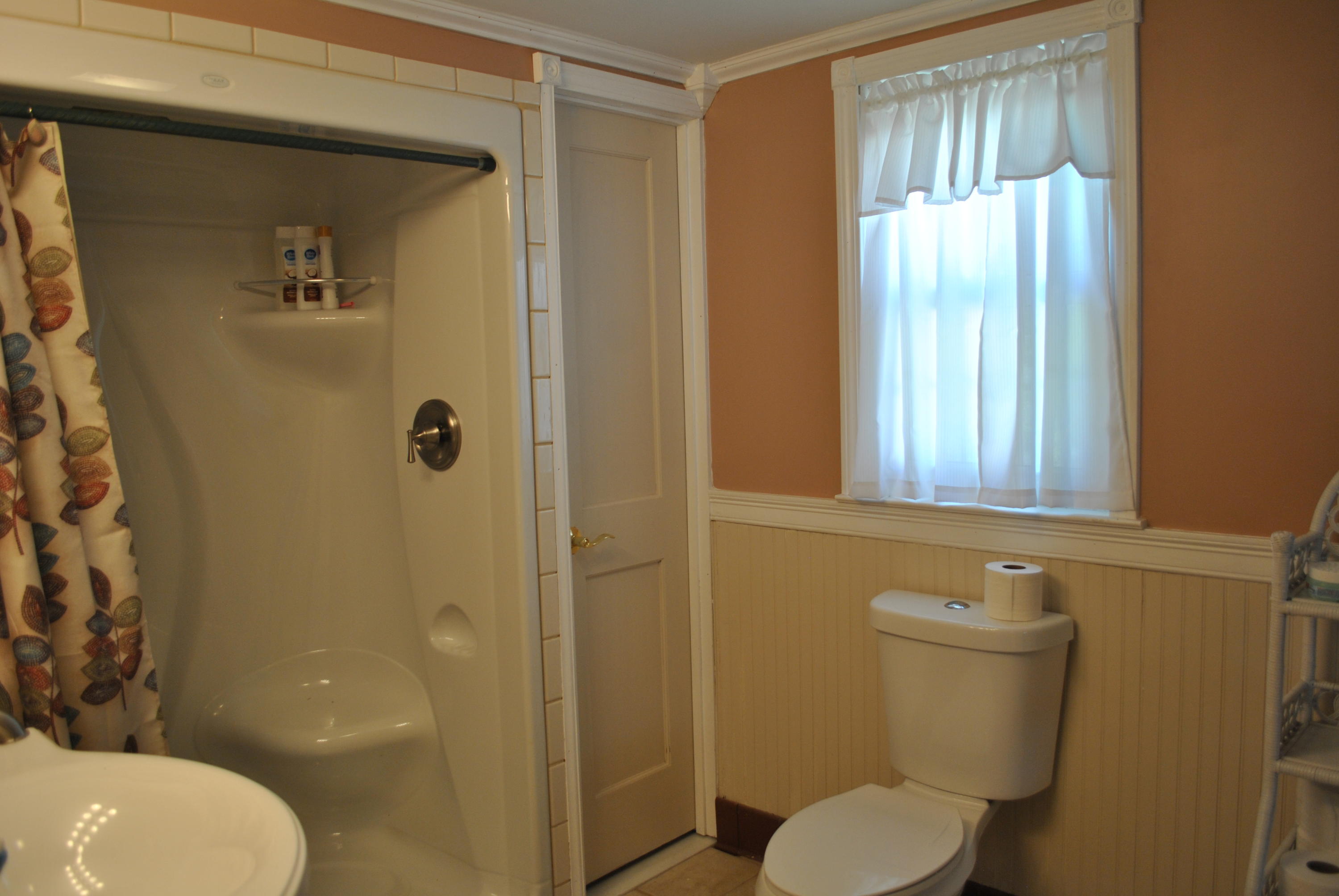 83 Lake Drive Centerville, MA 02632 - Photo 16 of 35 a bathroom with a toilet and a sink