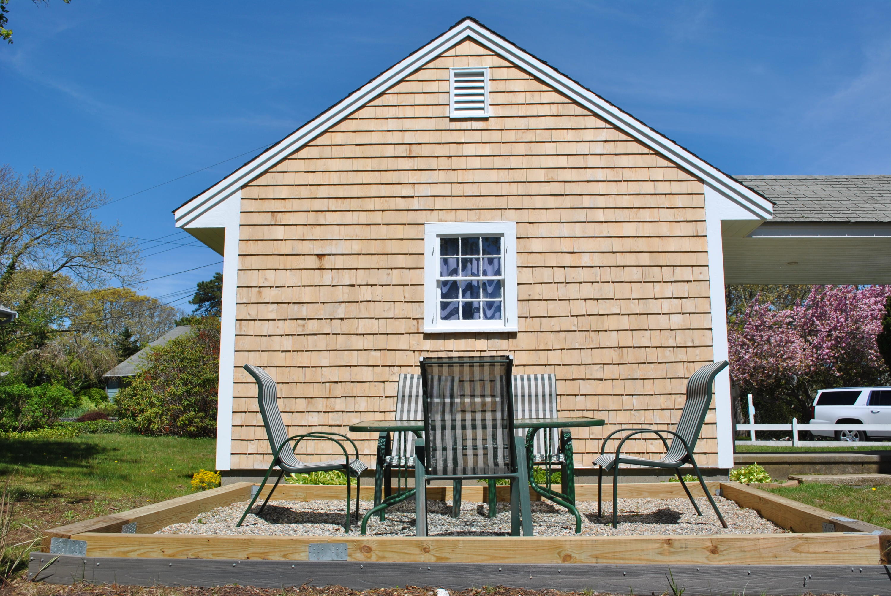 83 Lake Drive Centerville, MA 02632 - Photo 24 of 35 a view of backyard with seating space