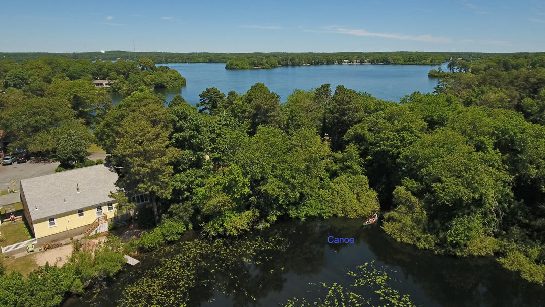 83 Lake Drive Centerville, MA 02632 - Photo 35 of 35 an aerial view of a houses with outdoor space and trees all around