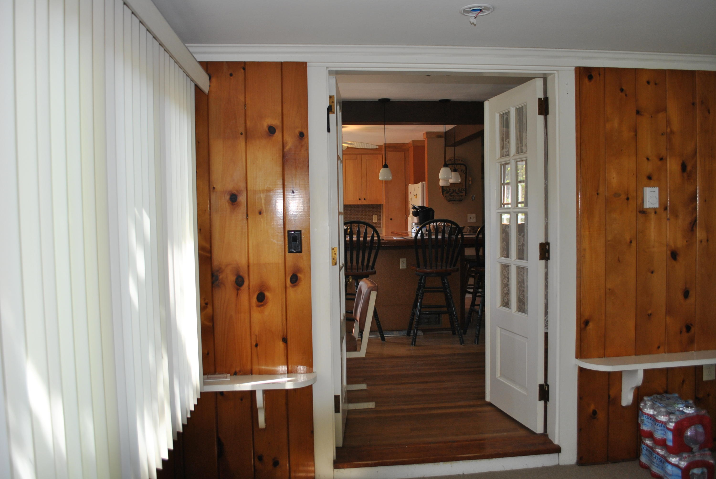 83 Lake Drive Centerville, MA 02632 - Photo 7 of 35 a view of a hallway with wooden floor and closet