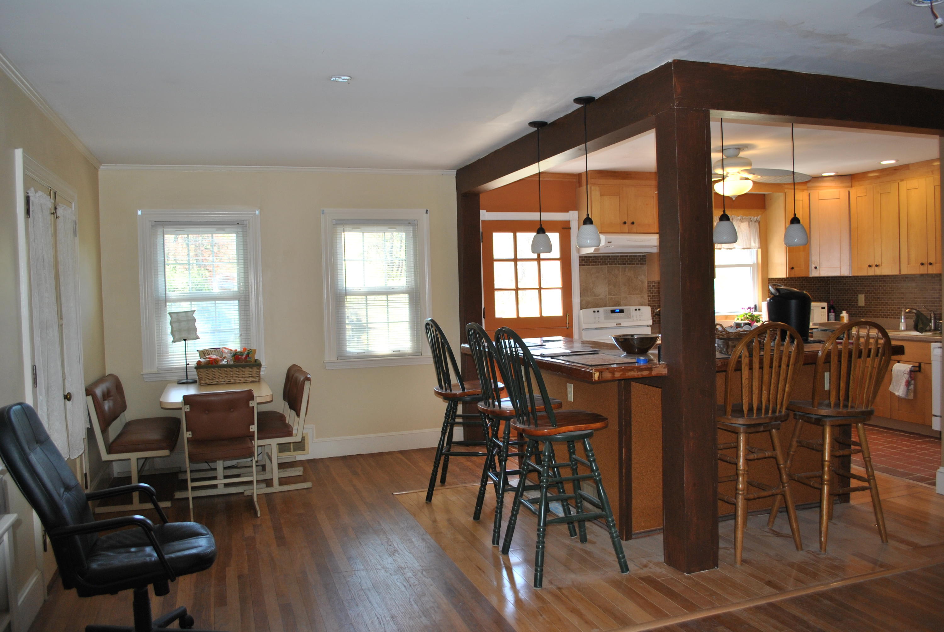 83 Lake Drive Centerville, MA 02632 - Photo 8 of 35 a view of a dining room with furniture and floor to ceiling window