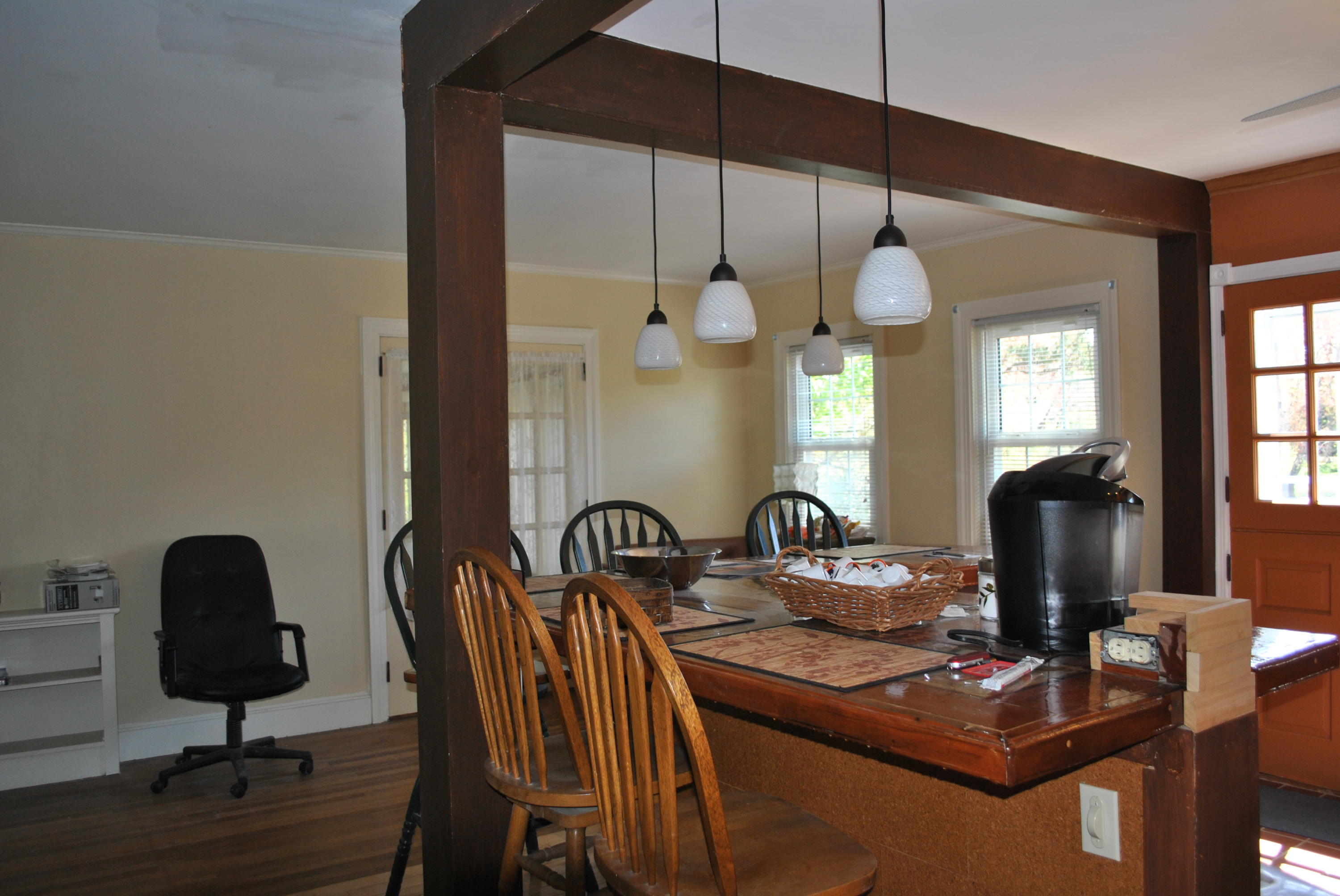 83 Lake Drive Centerville, MA 02632 - Photo 10 of 35 a view of a workspace room with wooden floor furniture and a mirror