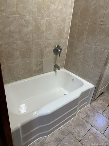 a bathroom with a bathtub