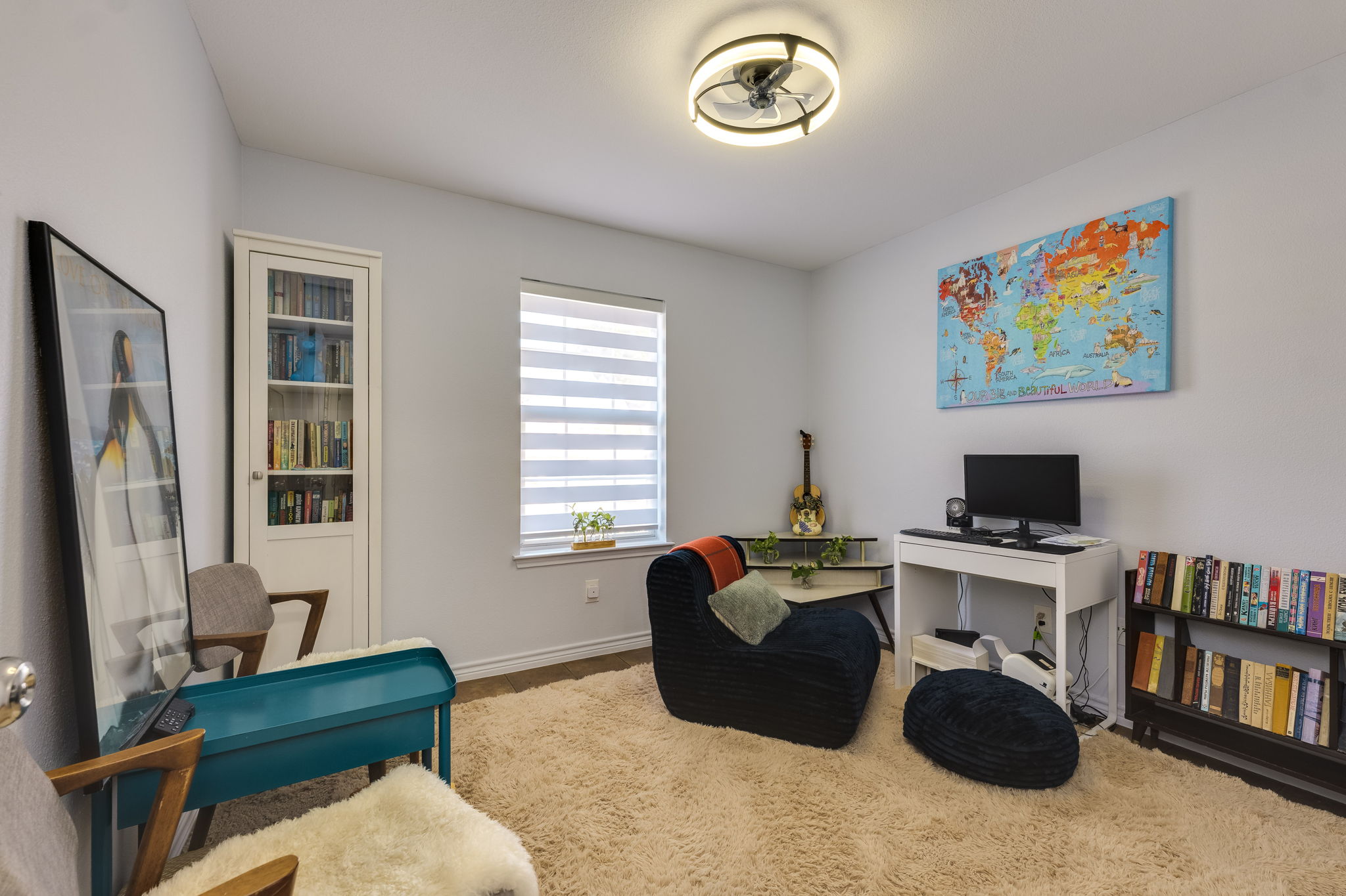 507 Clear Spring Lane Leander, TX 78641 - Photo 15 of 25 a living room with furniture and a flat screen tv