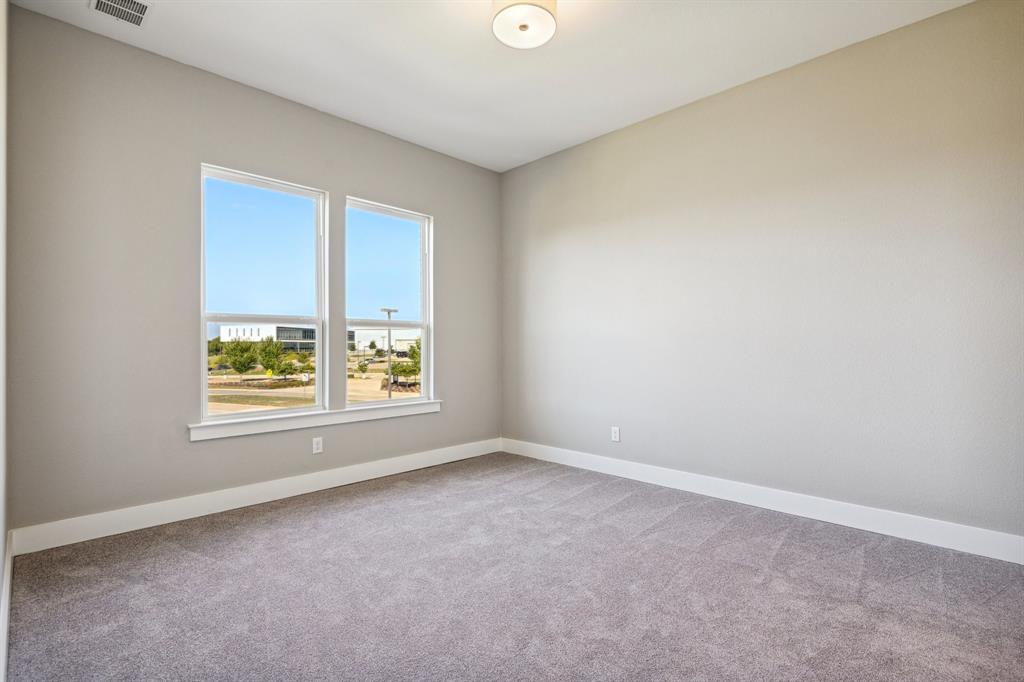 1711 Paytyn Drive Allen, TX 75013 - Photo 26 of 37 Spare room featuring carpet floors