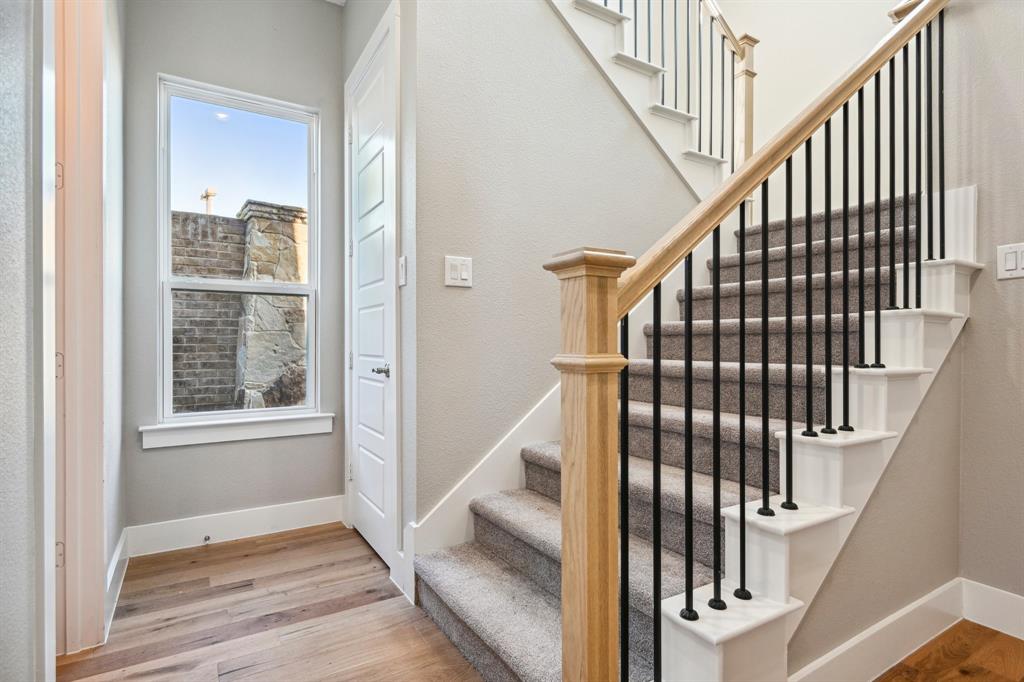 1711 Paytyn Drive Allen, TX 75013 - Photo 6 of 37 Stairway with hardwood / wood-style flooring