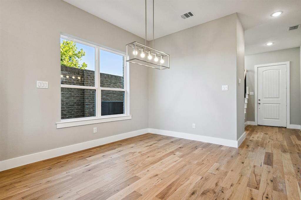 1711 Paytyn Drive Allen, TX 75013 - Photo 10 of 37 Unfurnished dining area with light hardwood / wood-style flooring