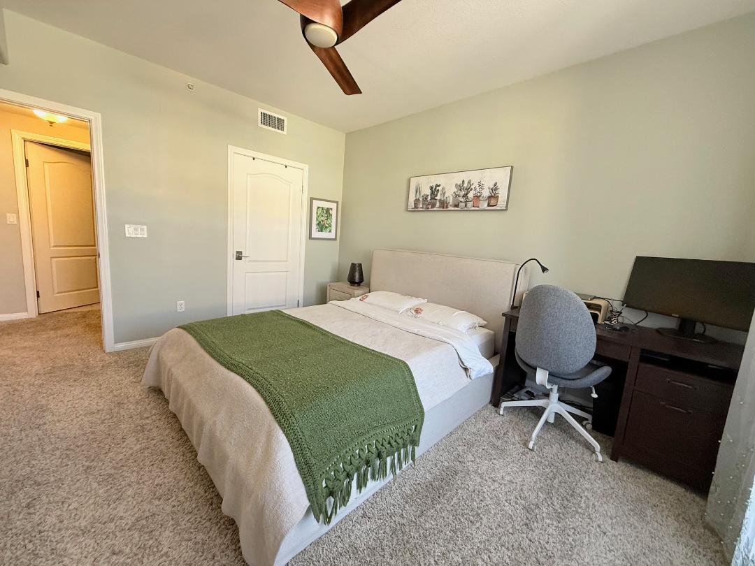 144 South 3rd Street, Unit 508 San Jose, CA 95112 - Photo 12 of 23 a bedroom with a bed and furniture