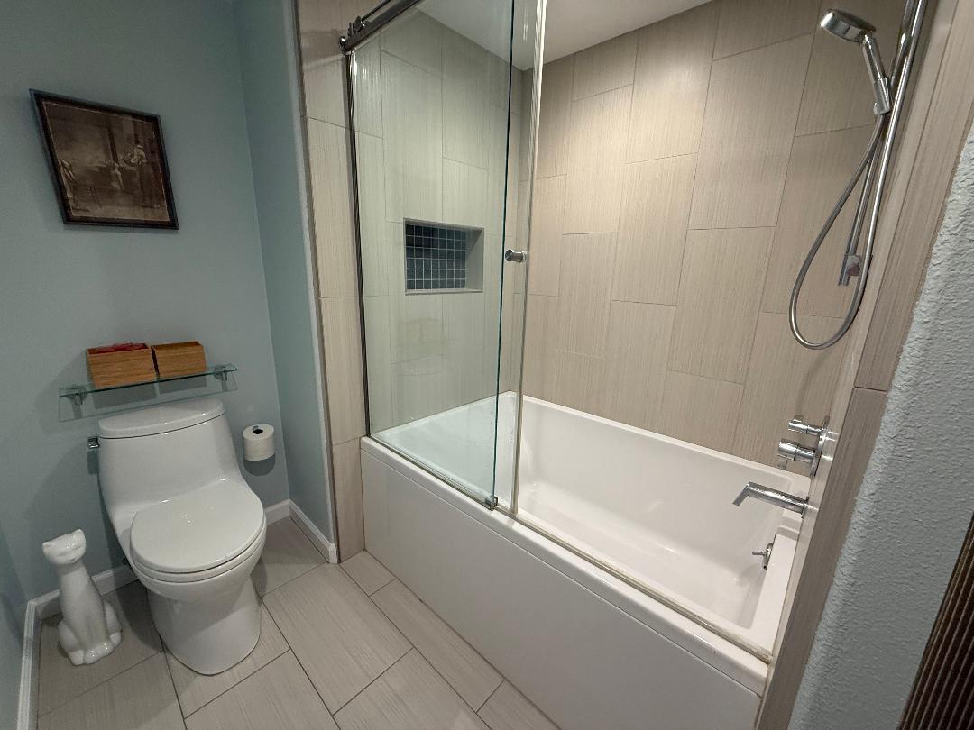 144 South 3rd Street, Unit 508 San Jose, CA 95112 - Photo 16 of 23 a bathroom with a toilet and a shower