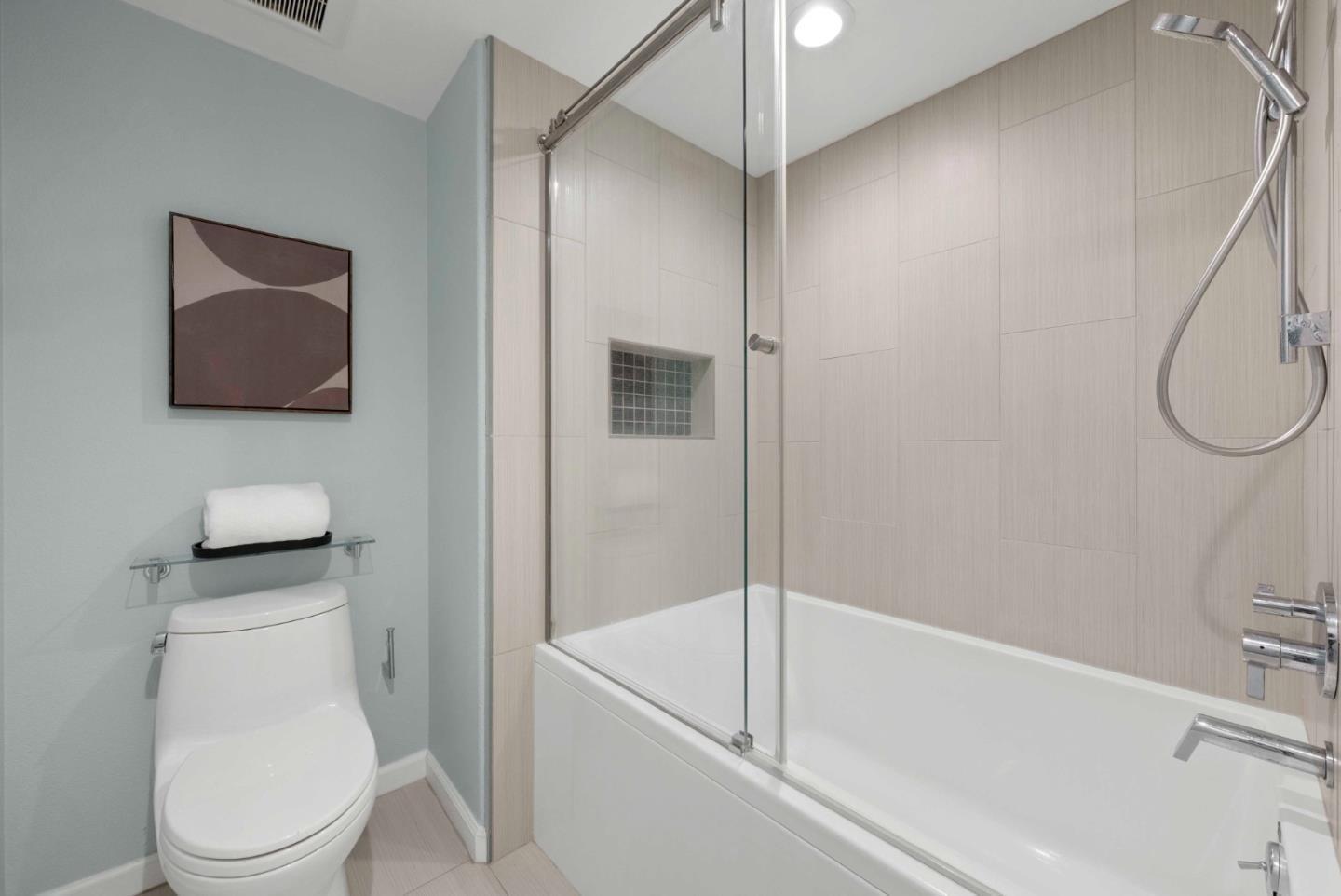 144 South 3rd Street, Unit 508 San Jose, CA 95112 - Photo 17 of 23 a bathroom with a toilet a sink and a shower