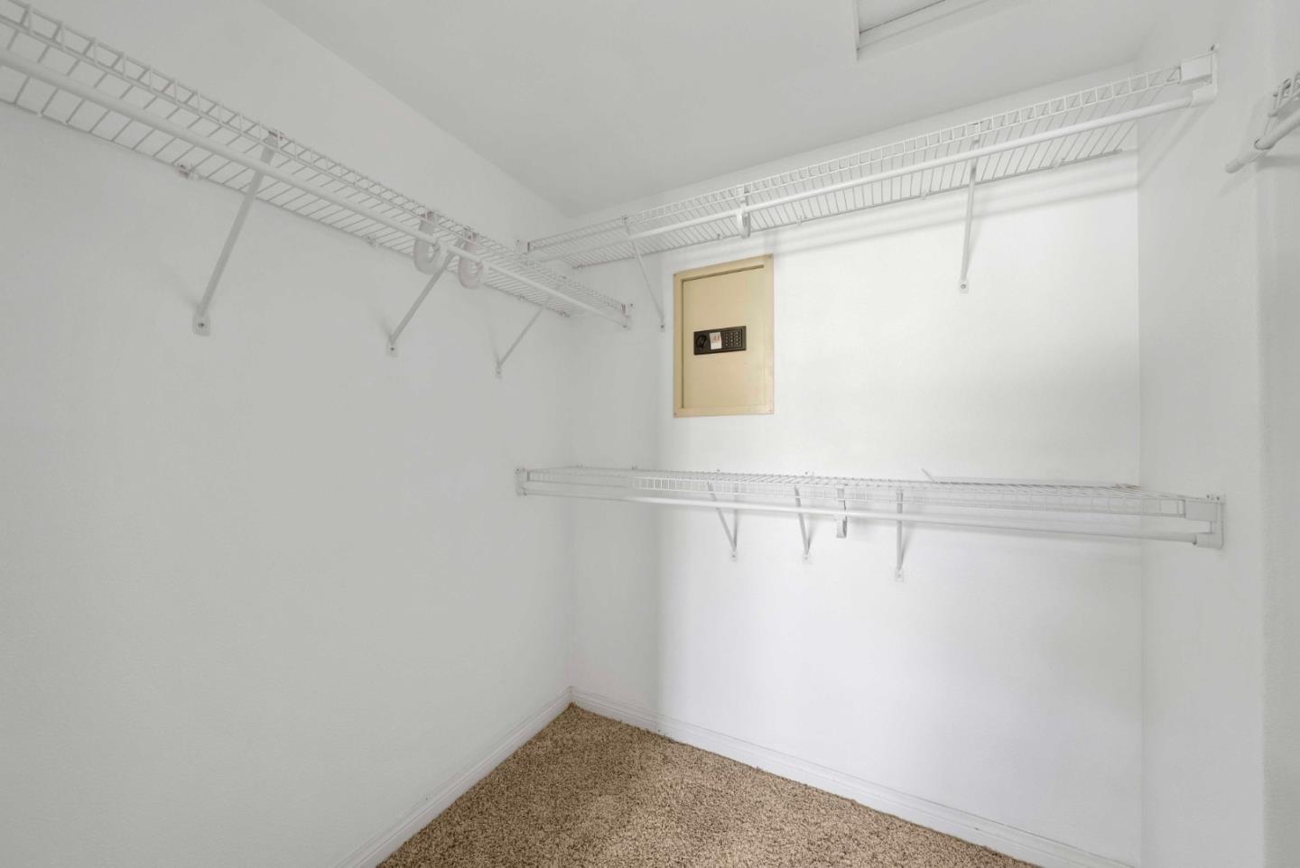 144 South 3rd Street, Unit 508 San Jose, CA 95112 - Photo 18 of 23 a view of a room with racks on the wall