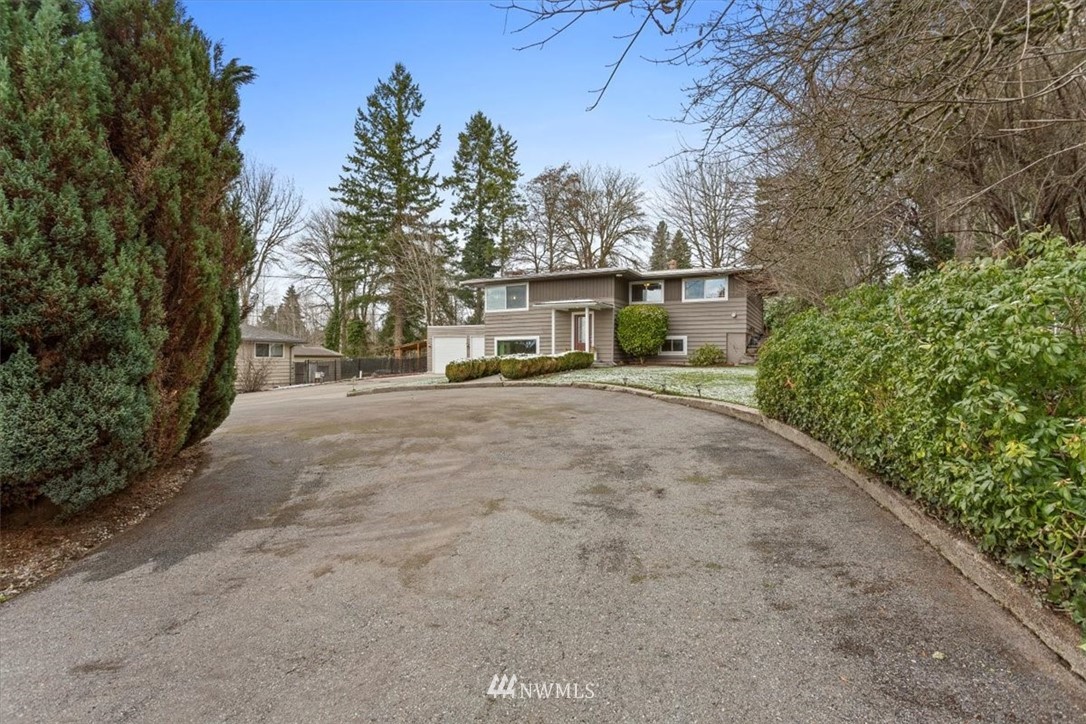 17526 Southeast 135th Street Renton, WA 98059 - Photo 4 of 37 a view of outdoor space with yard and tree s
