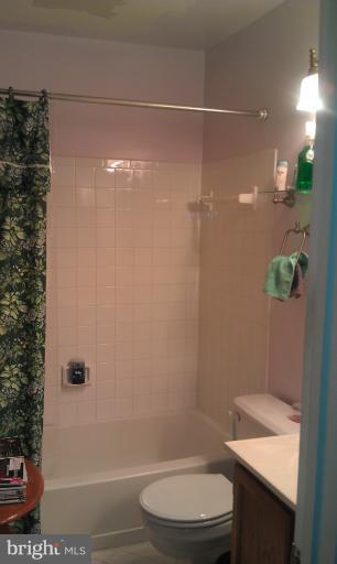 7353 St Thomas Loop Manassas, VA 20109 - Photo 14 of 20 a bathroom with a toilet and shower