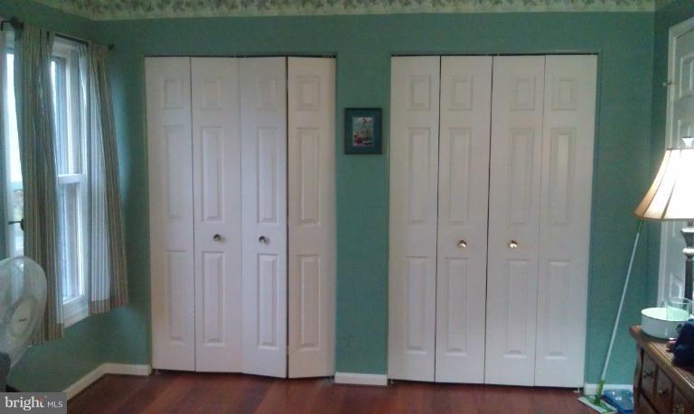 7353 St Thomas Loop Manassas, VA 20109 - Photo 20 of 20 a view of an entryway with wooden floor