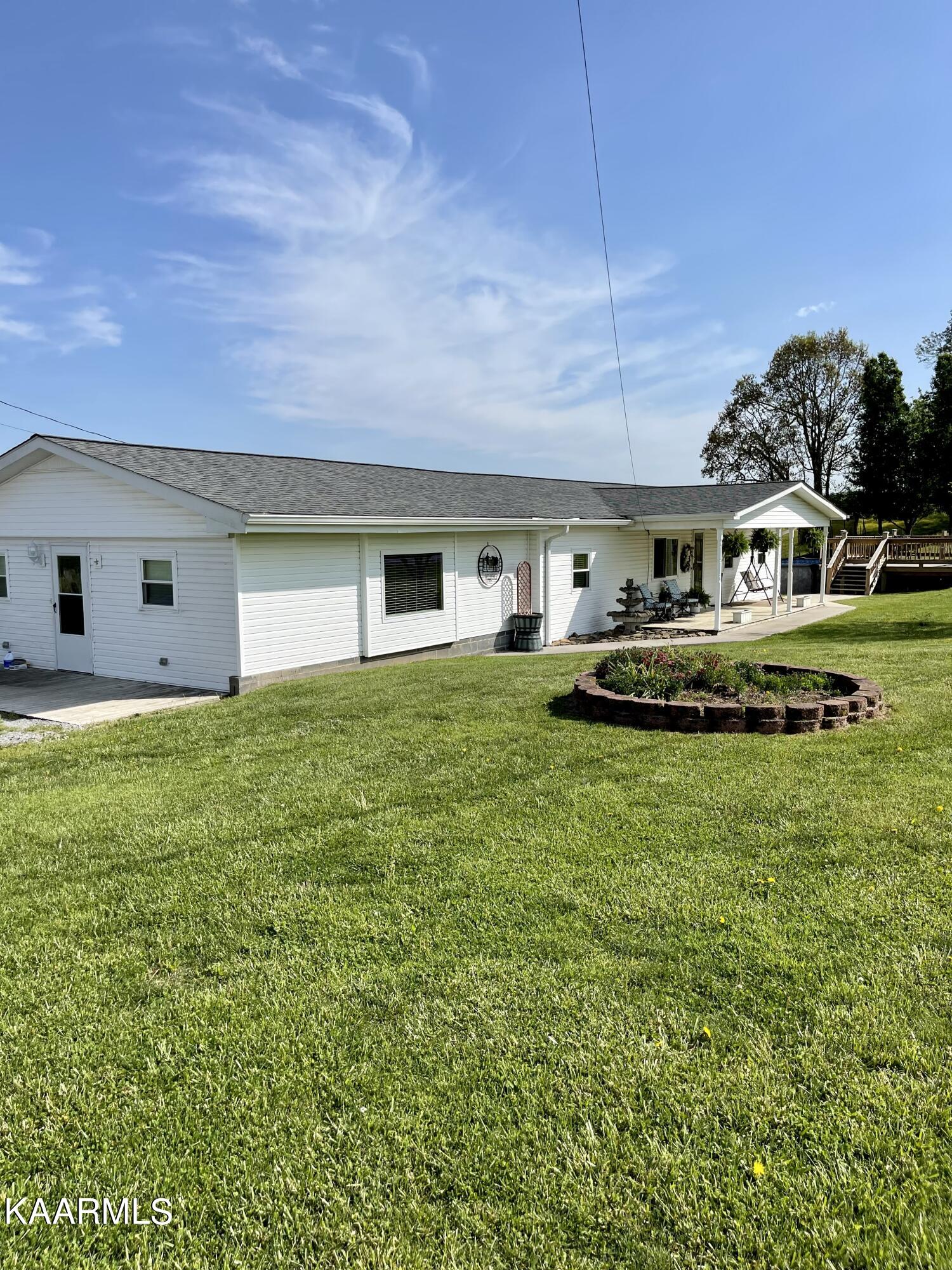 2334 Cave Springs Road Tazewell, TN 37879 - Photo 3 of 34 0CE4BB6B-D782-4B2B-8612-4DA5A6567F38