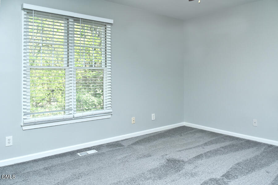 6 Justin Court Durham, NC 27705 - Photo 17 of 22 an empty room with a window