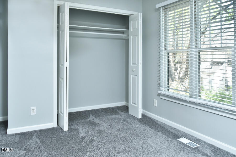 6 Justin Court Durham, NC 27705 - Photo 18 of 22 a view of an empty room with a window