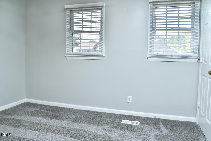 6 Justin Court Durham, NC 27705 - Photo 19 of 22 an empty room with a window