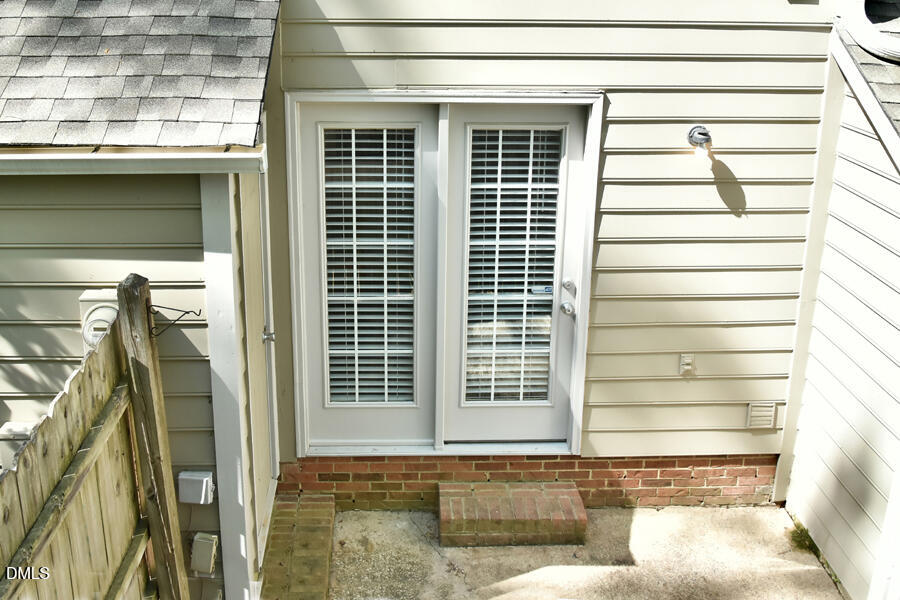 6 Justin Court Durham, NC 27705 - Photo 2 of 22 a view of entrance with buildings