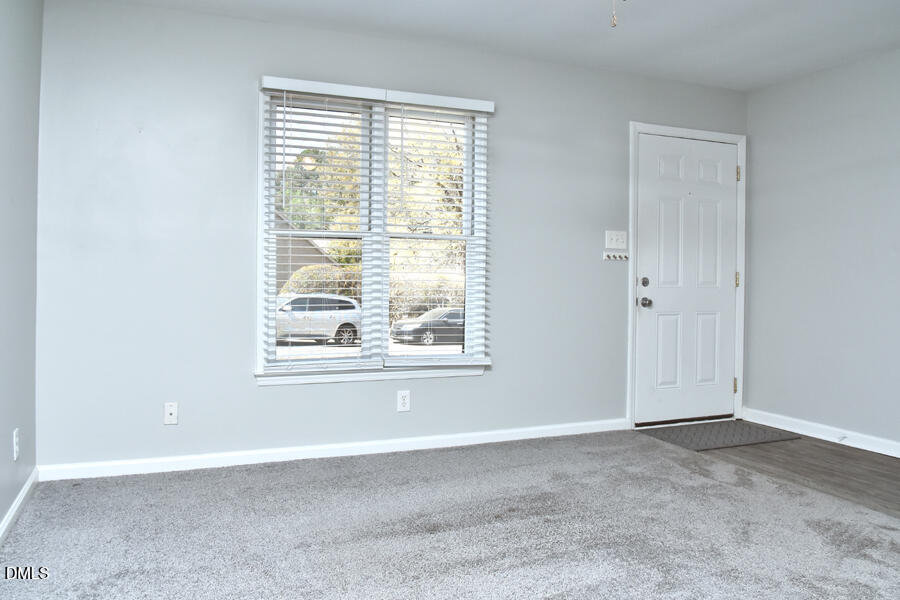6 Justin Court Durham, NC 27705 - Photo 4 of 22 an empty room with windows