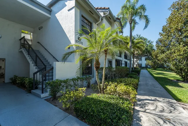 a view of sign board and yard