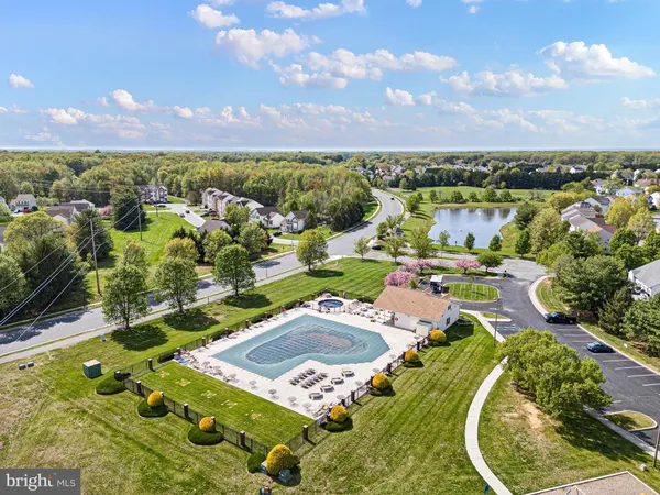 an aerial view of a house with outdoor space