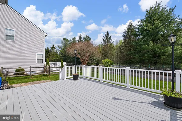 a view of a deck with a yard