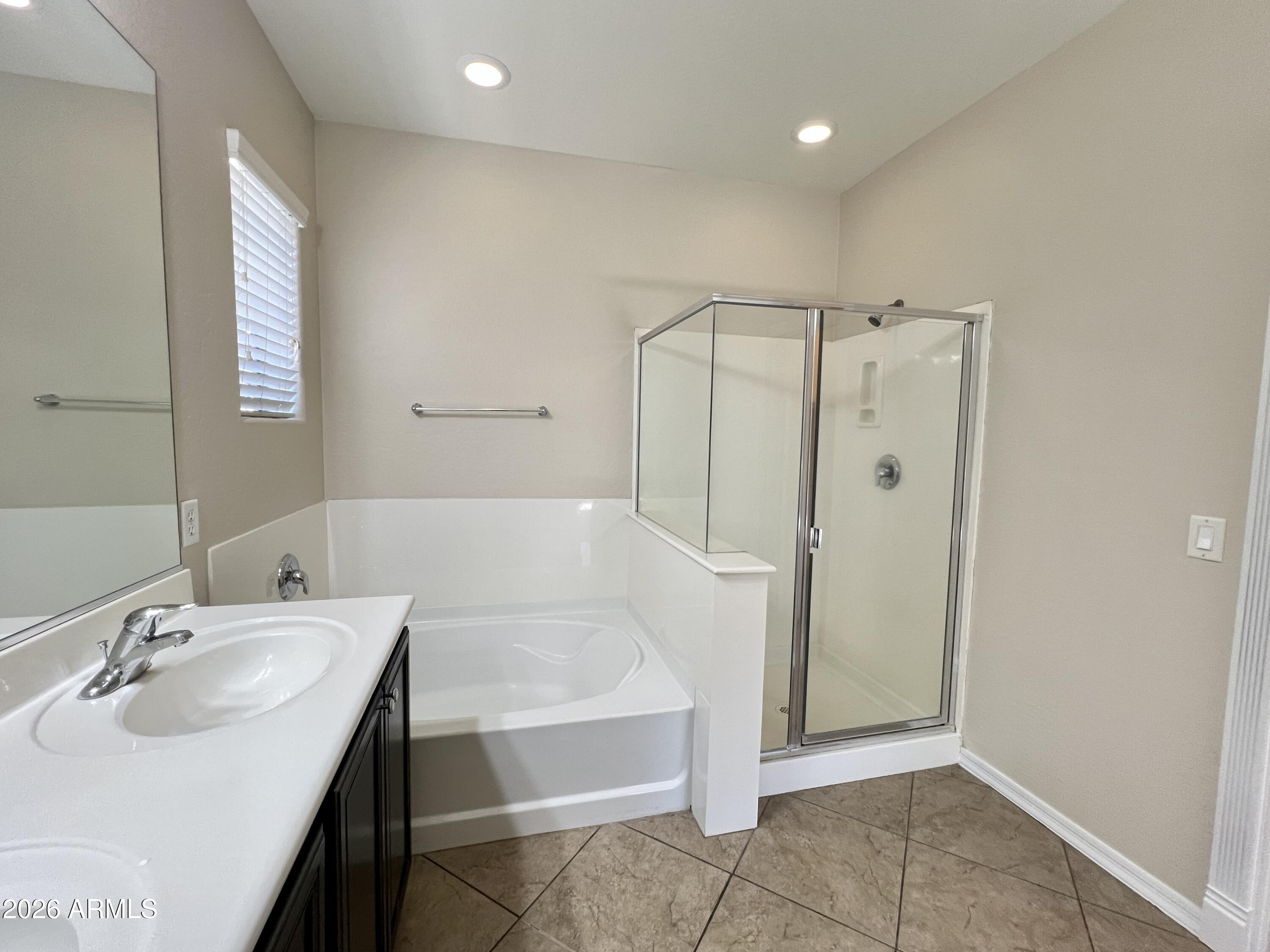 865 East Del Rio Street Chandler, AZ 85225 - Photo 13 of 15 a bathroom with a sink and a mirror