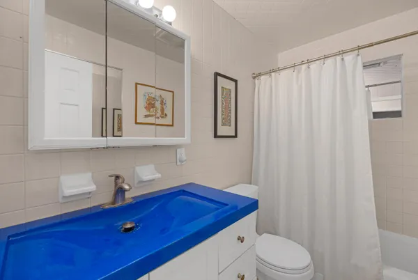 a view of a deck with furniture and wooden floor