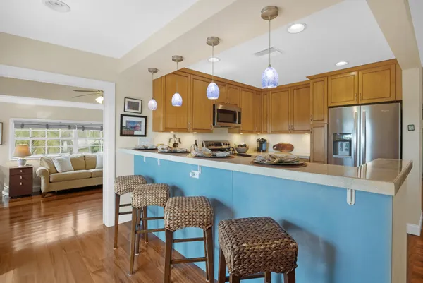 a bathroom with a sink a mirror and a toilet