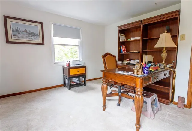 a room with furniture and a window