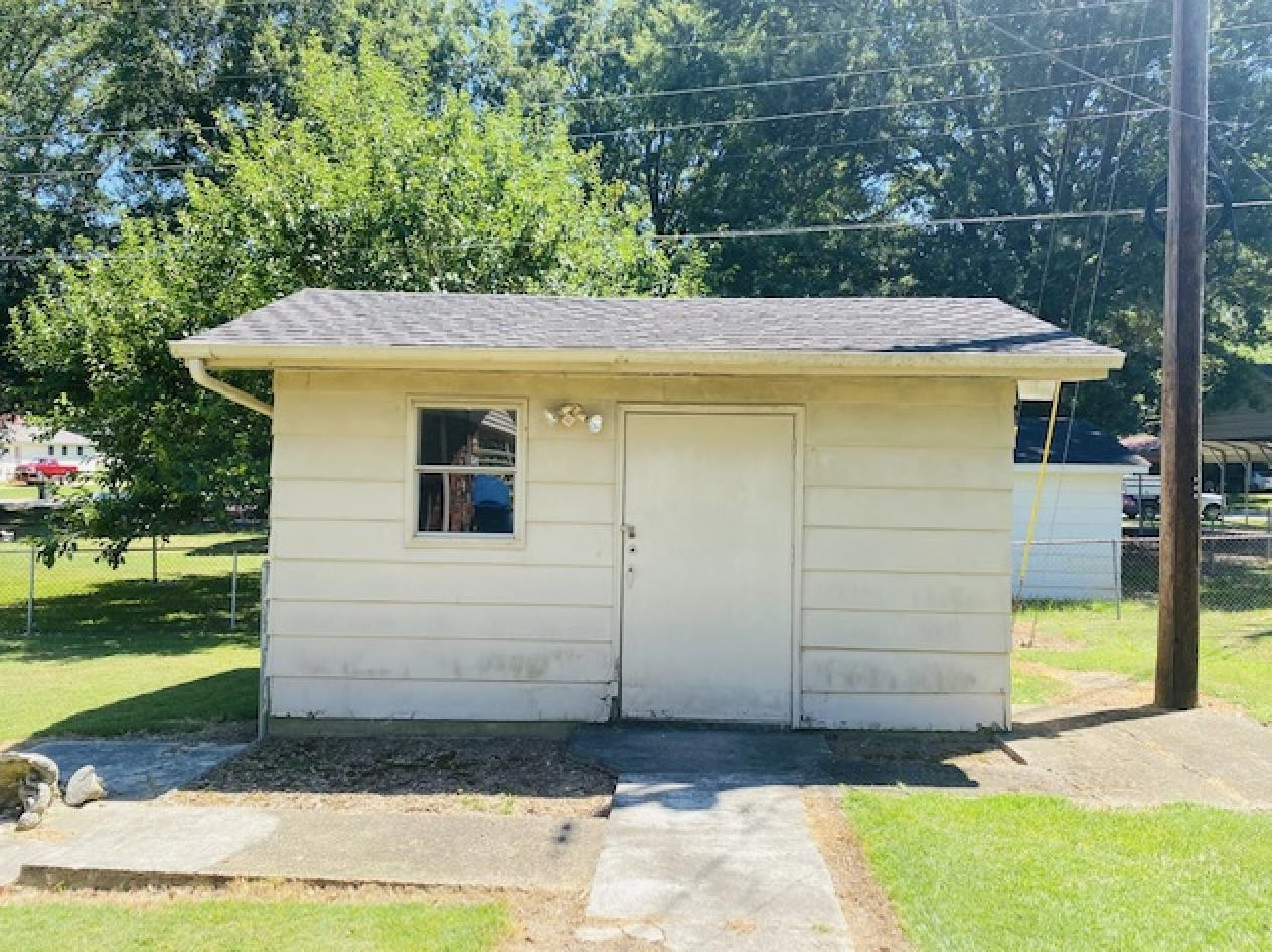 109 Morris Drive Rutherford, TN 38369 - Photo 16 of 18 a view of a house with a small yard