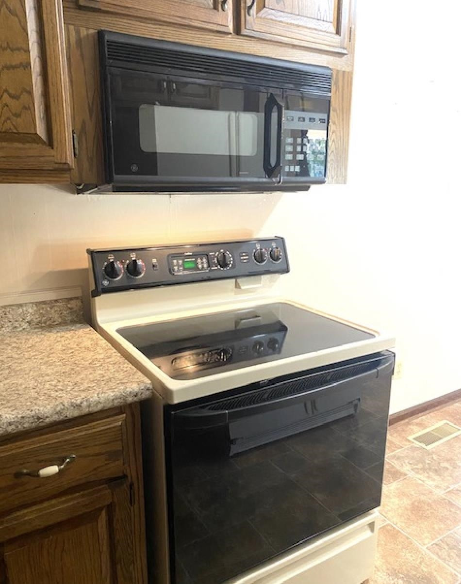 109 Morris Drive Rutherford, TN 38369 - Photo 10 of 18 a stove top oven sitting inside of a kitchen