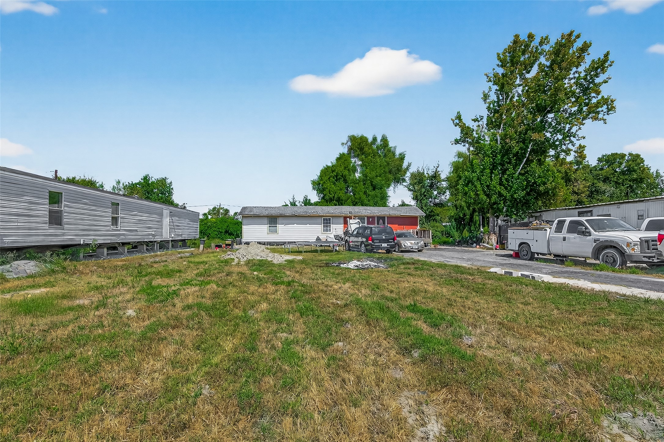 14215 Sweeney Road Houston, TX 77060 - Photo 1 of 5 a childrens park with lots of swings and slides