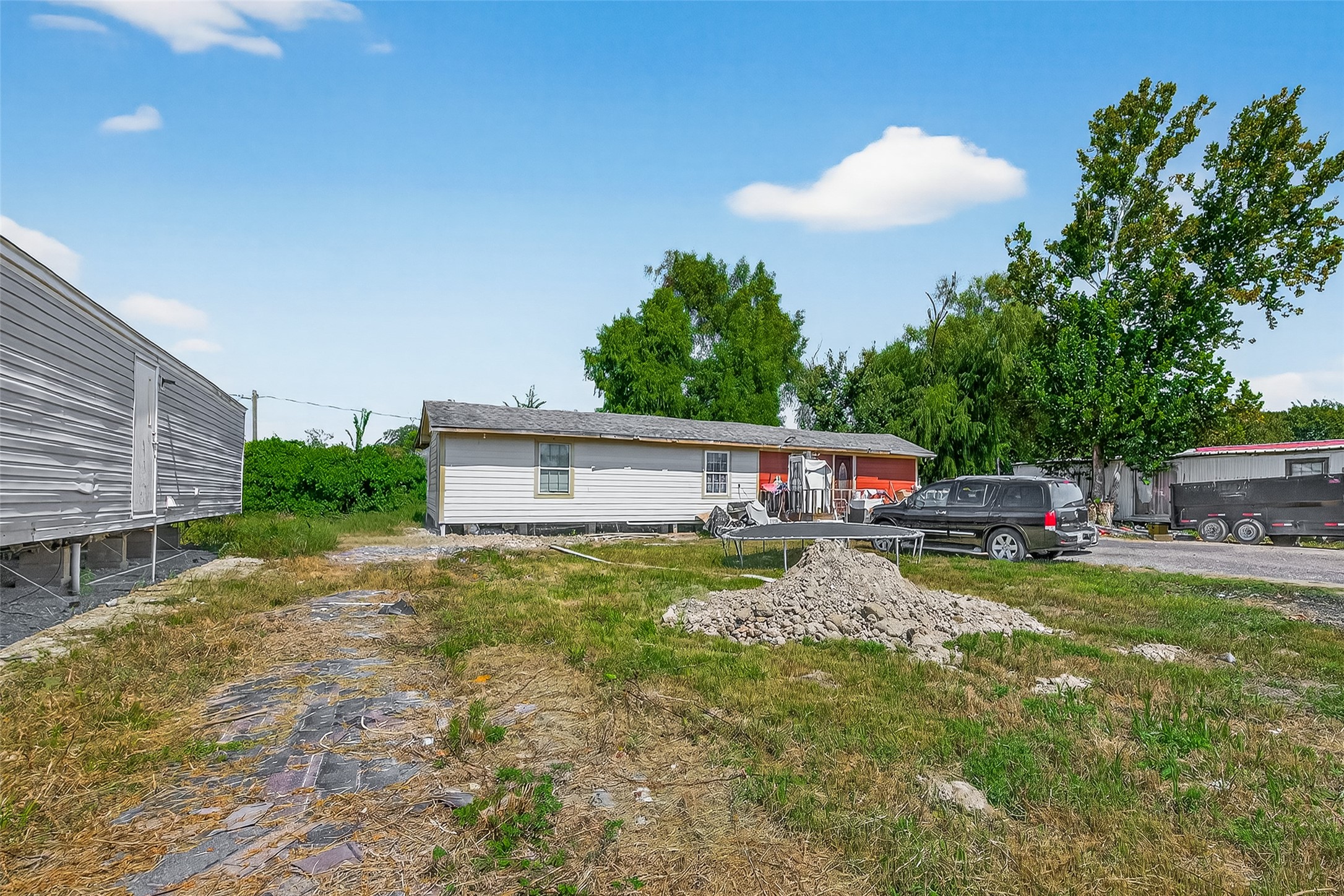 14215 Sweeney Road Houston, TX 77060 - Photo 3 of 5 a front view of a house with garden