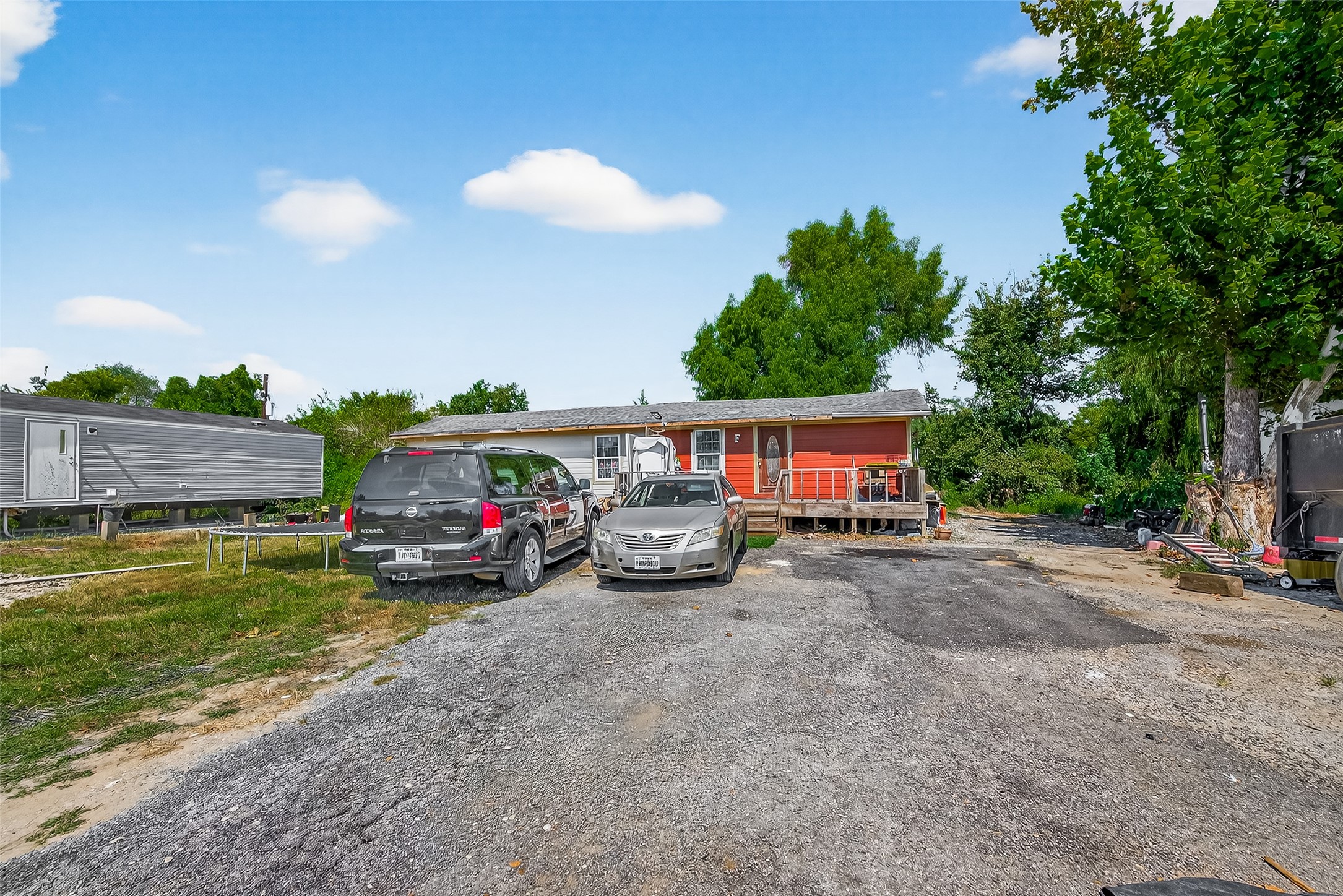 14215 Sweeney Road Houston, TX 77060 - Photo 4 of 5 a view of a car is parked in front of a house