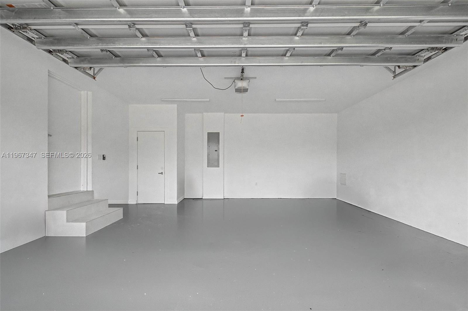 12940 Southwest 73rd Avenue Pinecrest, FL 33156 - Photo 33 of 38 a view of a room with racks on the wall