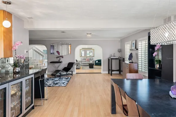 a living room with furniture rug and window