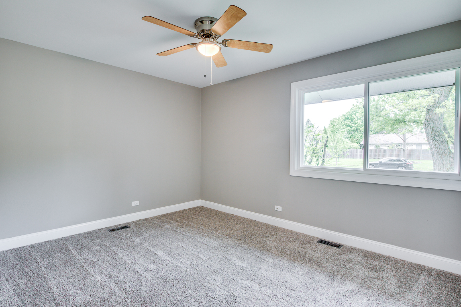 106 Foxcroft Road Naperville, IL 60565 - Photo 18 of 21 an empty room with a window