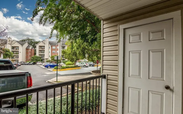 a view of a street from a balcony