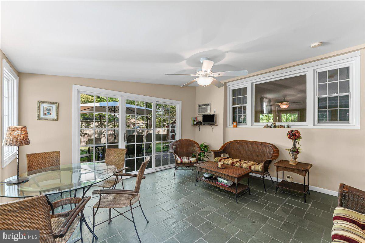 243 Rambling Way Springfield, PA 19064 - Photo 16 of 42 a living room with furniture and large windows